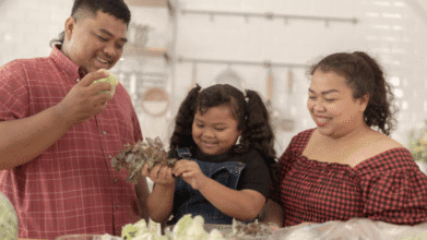 Filipino family bonding over vegetables at home for Mother's Day 2025 celebration.
