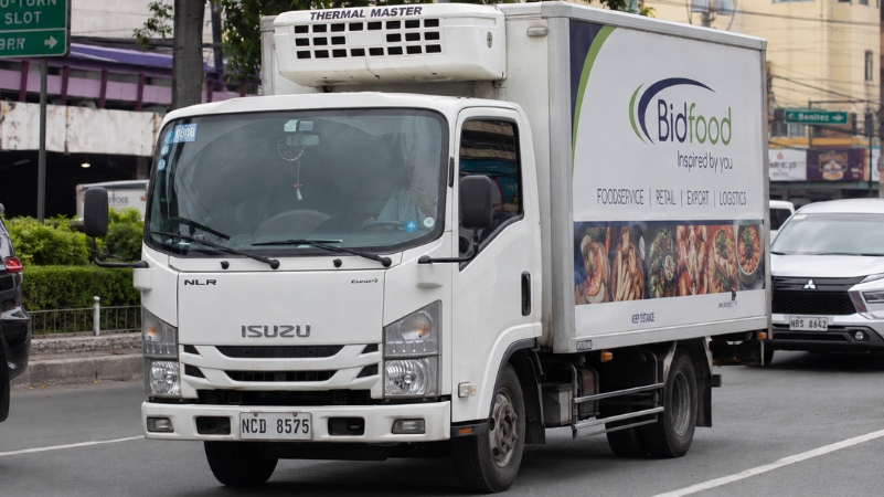 Refrigerated truck delivering food products in Metro Manila
